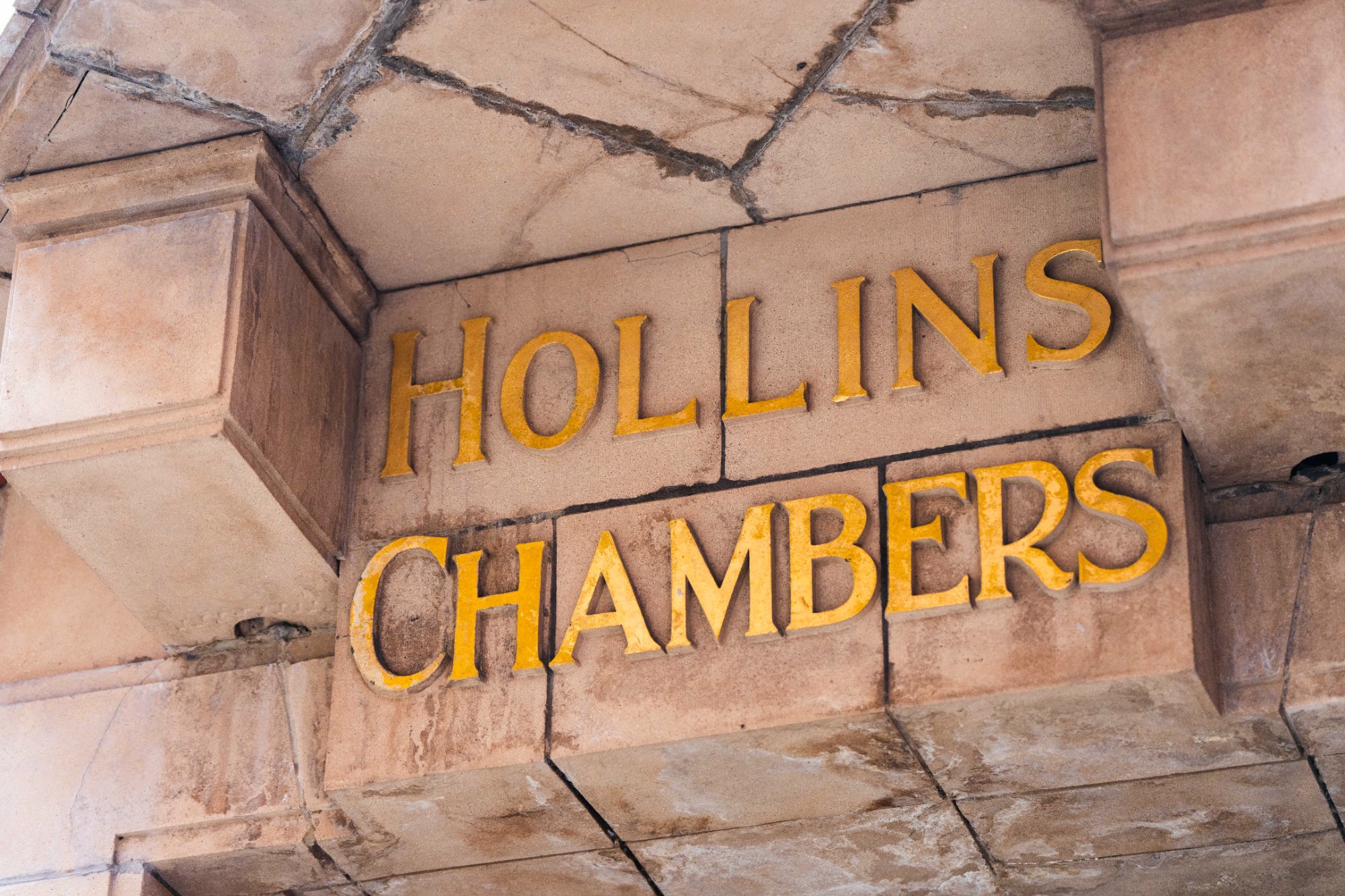 Hollins Chambers gold lettering